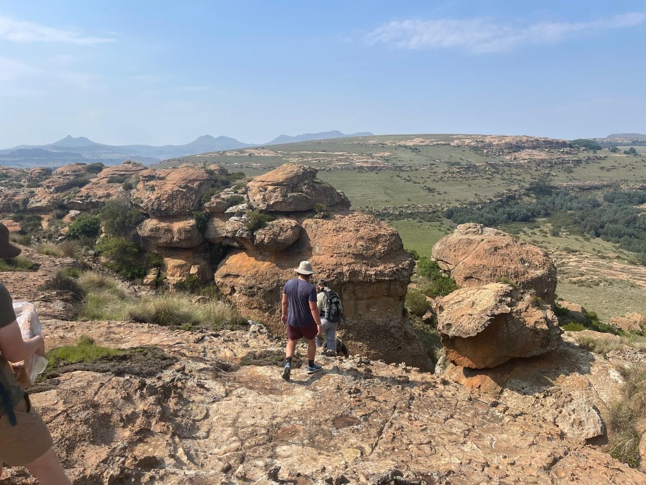 Men walking through the wilderness during Adventure to Live camp